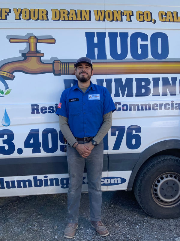 Hugo Plumbing team member and happy Houston customer